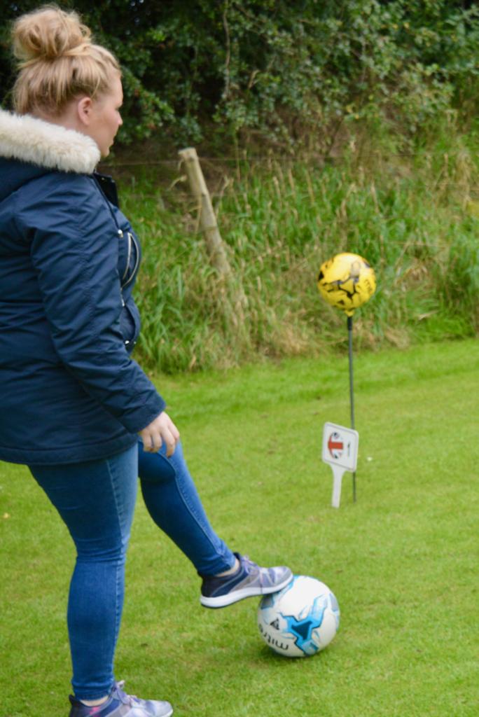 girl-taking-shot-put2golf-penrith-golf-football-stag-party-lake-district-elle-blonde-luxury-lifestyle-destination-blog